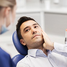 Man visiting his emergency dentist in Evanston, IL for a hurting tooth