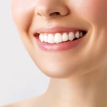 Woman with white teeth smiling